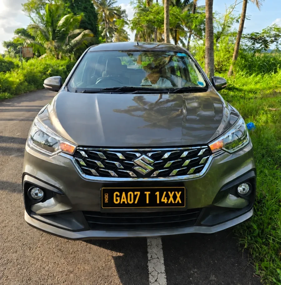Self-drive rental car in Goa with black plate and yellow lettering